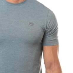 TravisMathew Scenic Vista Active Tee -Callaway Store travismathew scenic vista active tee heather copen blue logo itempicture